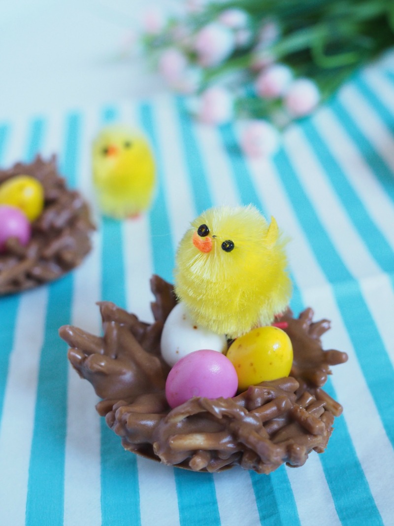Little nests made of chocolate and fried noodles filled with mini eggs