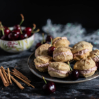 cinnamon shortbread cookies with creamy cherry filling